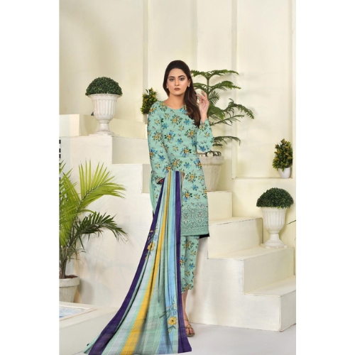 Woman in a light blue floral saree with a colorful border in a decorated room.