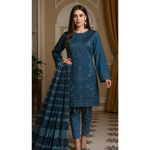 Woman wearing a blue embroidered kurta with a matching saree in an indoor setting.