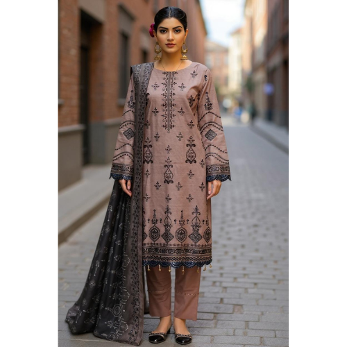 Woman wearing a traditional outfit with a patterned top and black dupatta on a street.