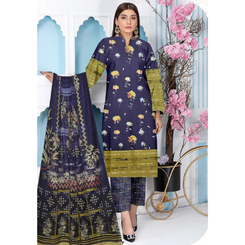 Woman wearing a floral dress with a matching dupatta in a decorative setting with pink flowers.