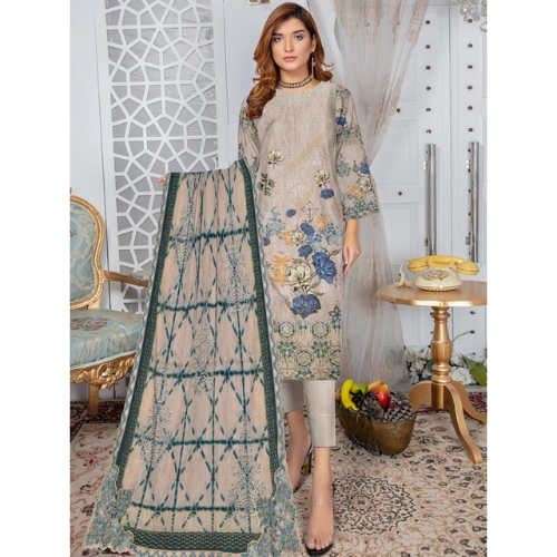 Woman wearing a floral dress with a geometric scarf in an elegant room.