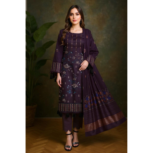 Woman wearing a dark purple traditional outfit with a matching dupatta against a dark background