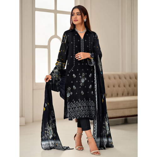 Woman wearing a black embroidered outfit with a matching dupatta in an indoor setting.