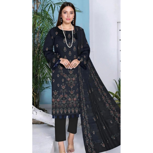 Woman wearing a black embroidered outfit with a white background