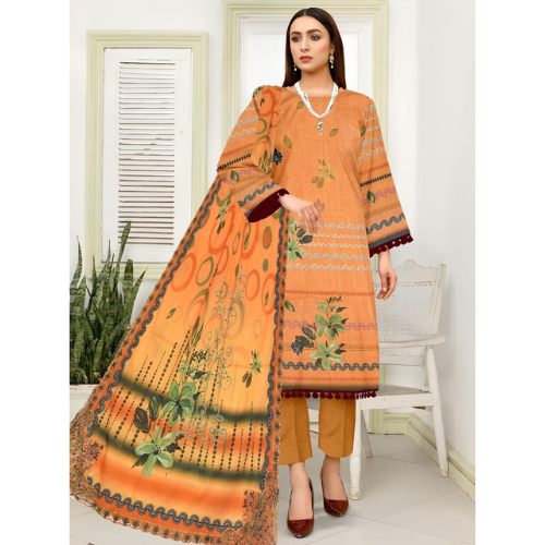 Woman wearing an orange embroidered suit with a matching dupatta in a room.