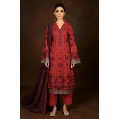 Red embroidered traditional outfit with a brown background
