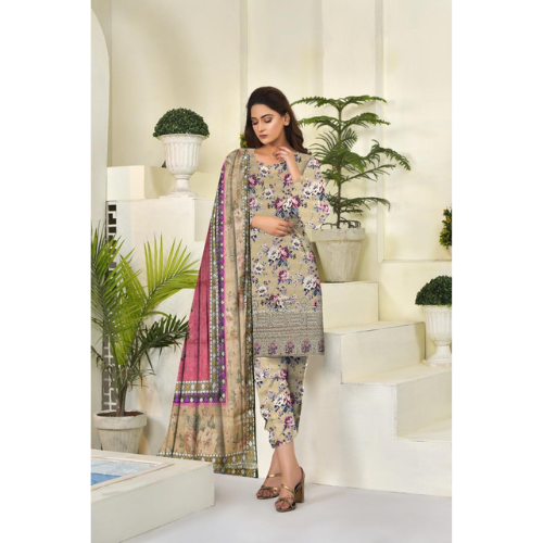 Woman in a floral dress standing in a well-lit room with plants.